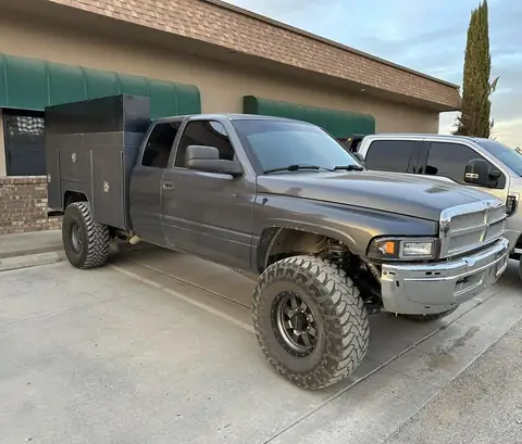 1997 Dodge Ram 2500 window tint: Old tint removal rear side windows, 5% Nano Ceramic rear 3 windows, 5% Windshield strip