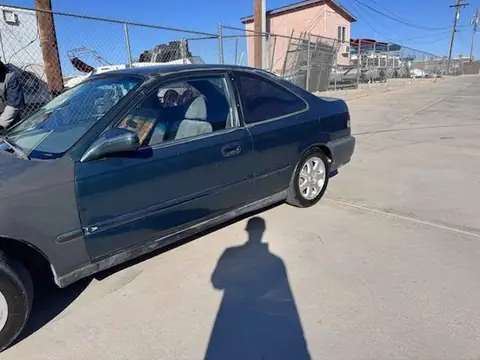 1997 Honda Civic window tint: Removed OLD OLD OLD tint off of 5 windows & the sunroof, Replaced with 5% all sides, rear & sunroof including a 3%
