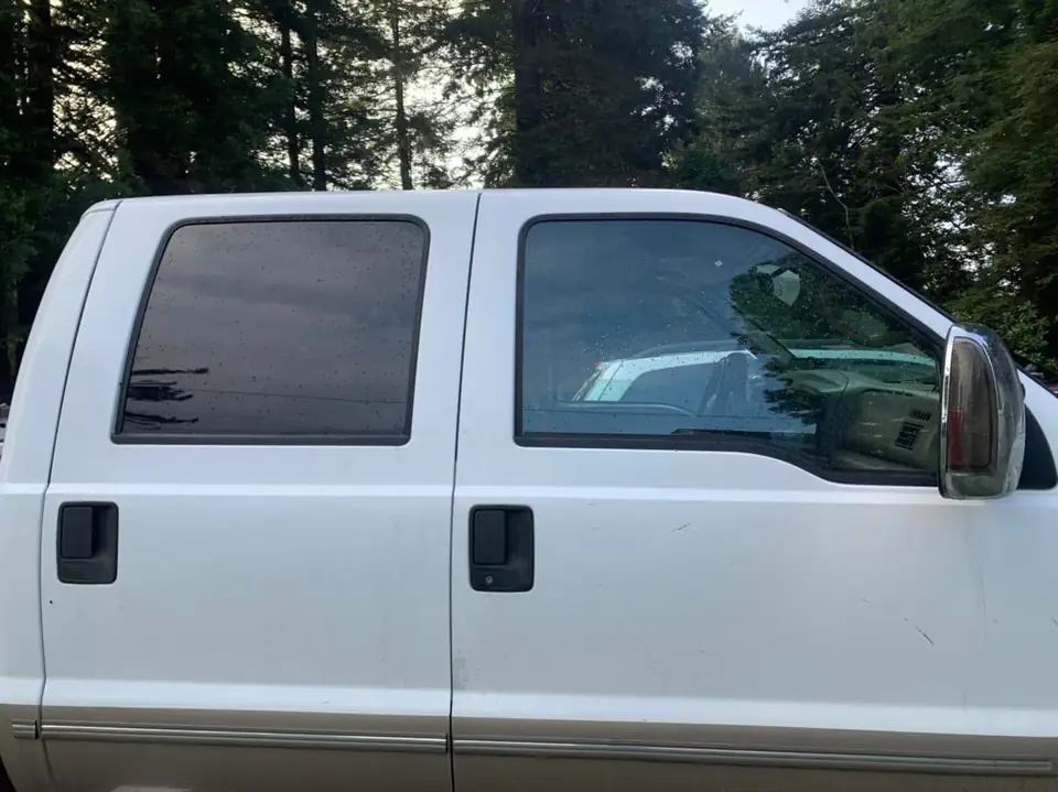 1999 Ford F-350 window tint: 5% all around, 5% medium visor (view 2)