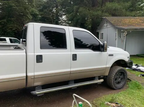 1999 Ford F-350 window tint: 5% all around, 5% medium visor (view 3)