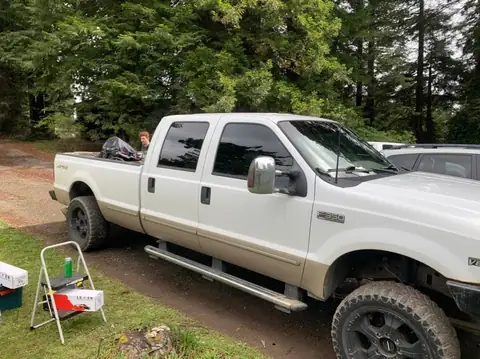 1999 Ford F-350 window tint: 5% all around, 5% medium visor (view 4)