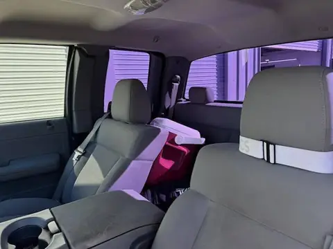 2000 Ford F-150 window tint: Removal of purple faded tint on rear 3 windows, New 5% Carbon rear 3 windows, 20% front doors, 3% windshield strip (view 5)