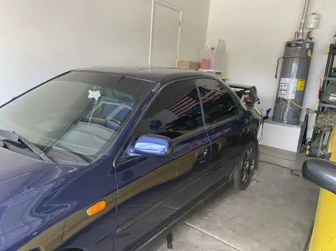 2000 Subaru Impreza RS window tint: 5% Premium Ceramic front 2 windows (view 2)