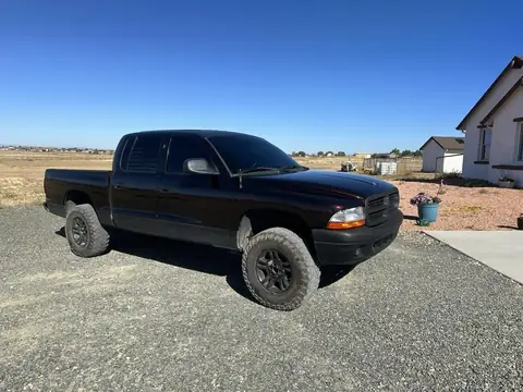 2001 Dodge Dakota gloss black wrap: Gloss demon black full wrap and roof wrapped in gloss black