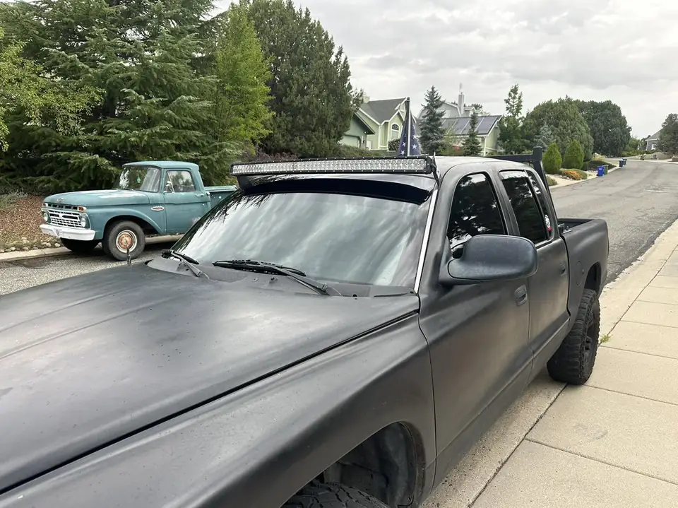 2001 Dodge Dakota window tint: Strip front doors and windshield, Xpel 5% over Xpel 20% carbon/ceramic, 50% Nano Ceramic full windshield, 5% sunstrip (view 2)