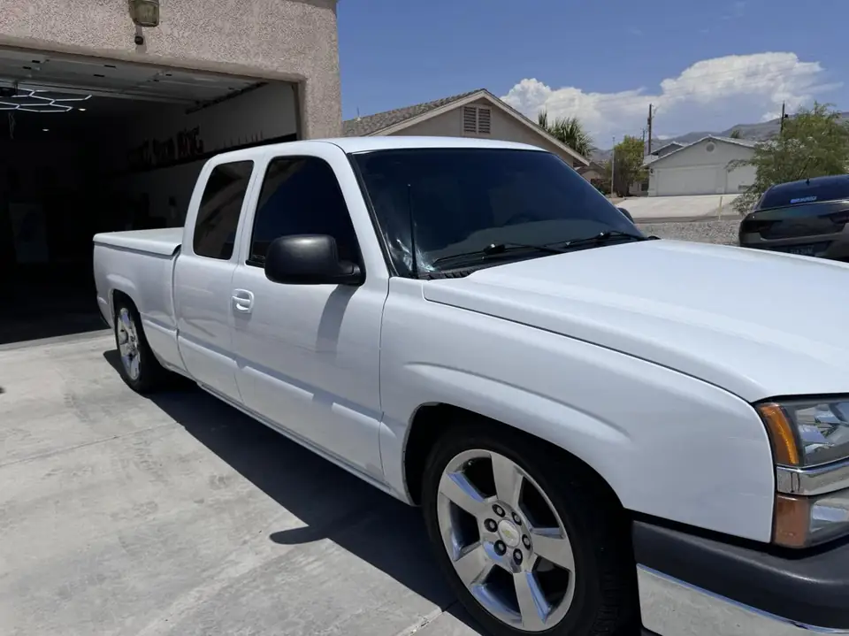 2002 Chevy pickup window tint: Removal of old film on all windows, 5% Carbon Ceramic rear 3 windows, 15% Carbon Ceramic front doors, 50% Carbon (view 2)