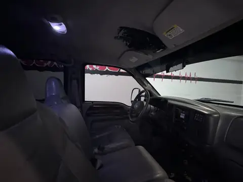2002 Ford F-350 window tint: Removed old tint from front and rear doors, New 5% Ceramic rear doors and rear 3piece window, 15% Ceramic front doors (view 3)