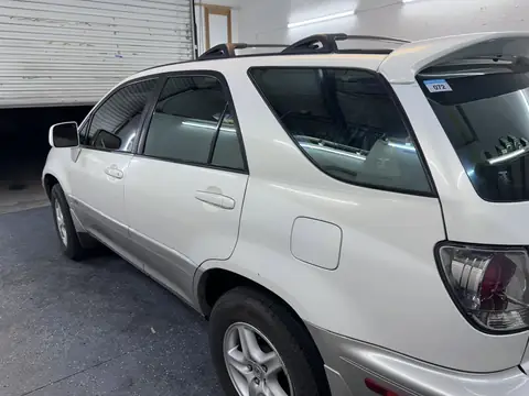 2002 Lexus RX300 window tint: Full removal, New 5% rear half, 25% front doors, 5% sun strip