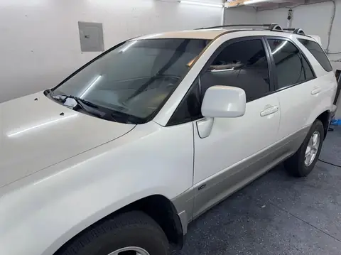 2002 Lexus RX300 window tint: Full removal, New 5% rear half, 25% front doors, 5% sun strip (view 2)