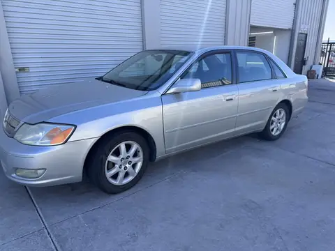 2002 Toyota Avalon window tint: 5% C-IR rear half, 15% C-IR front doors, 5% sunstrip