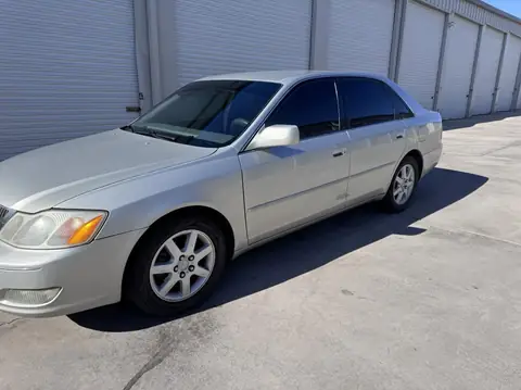 2002 Toyota Avalon window tint: 5% C-IR rear half, 15% C-IR front doors, 5% sunstrip (view 2)
