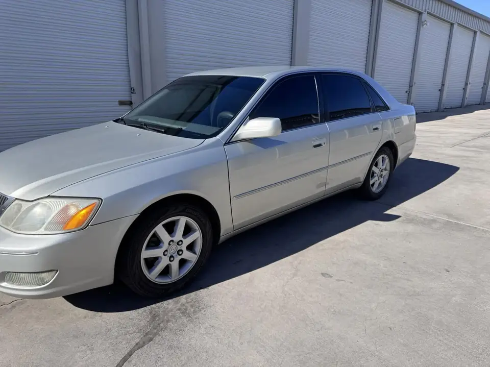 2002 Toyota Avalon window tint: 5% C-IR rear half, 15% C-IR front doors, 5% sunstrip (view 2)