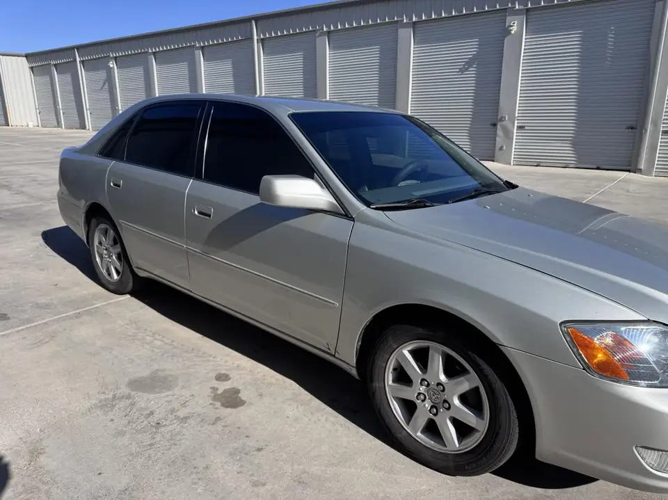 2002 Toyota Avalon window tint: 5% C-IR rear half, 15% C-IR front doors, 5% sunstrip (view 3)