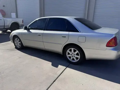 2002 Toyota Avalon window tint: 5% C-IR rear half, 15% C-IR front doors, 5% sunstrip (view 4)