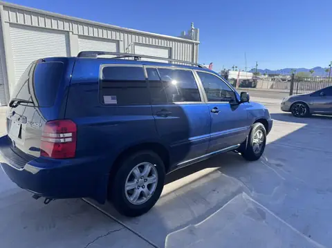 2002 Toyota Highlander window tint: 5% C-IR over the rear half privacy windows, 25% C-IR front doors, 5% sunstrip (view 2)