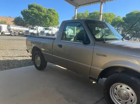 2003 Ford Ranger window tint: 15% supreme doors and rear windshield, 5% sun strip (view 2)