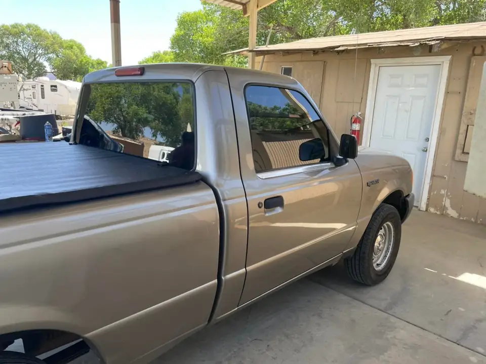 2003 Ford Ranger window tint: 15% supreme doors and rear windshield, 5% sun strip (view 5)