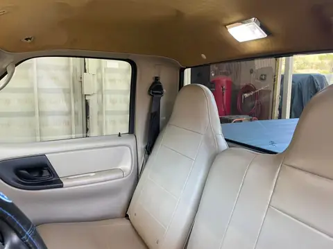 2003 Ford Ranger window tint: 15% supreme doors and rear windshield, 5% sun strip (view 7)