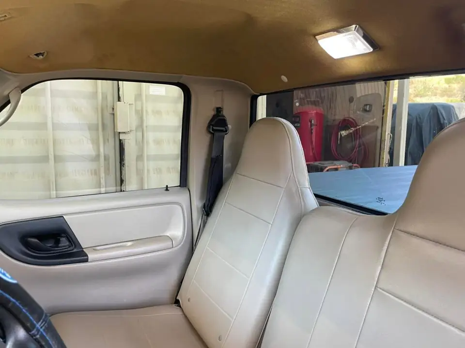 2003 Ford Ranger window tint: 15% supreme doors and rear windshield, 5% sun strip (view 7)