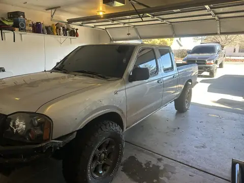 2003 Nissan Frontier window tint: 5% nano ceramic rear three windows, 5% nano ceramic over 20% nano ceramic front windows, 40 nano ceramic full (view 2)