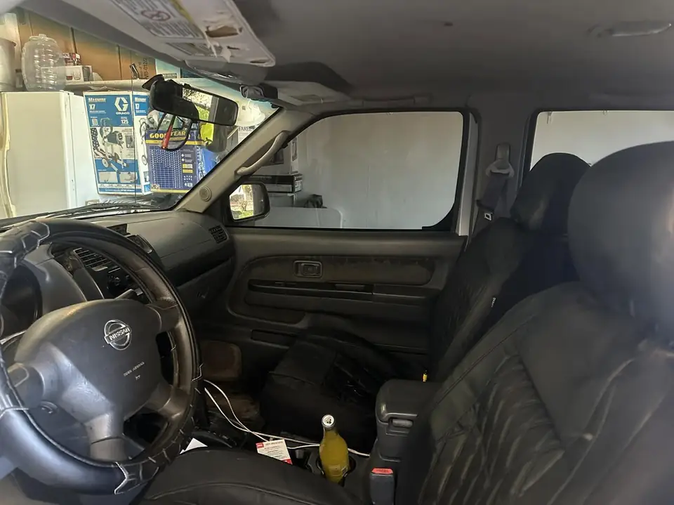 2003 Nissan Frontier window tint: 5% nano ceramic rear three windows, 5% nano ceramic over 20% nano ceramic front windows, 40 nano ceramic full (view 3)