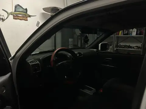 2004 Chevy Colorado window tint: Remove old faded tint from front doors, 20% nano ceramic front doors, 20% nano ceramic full front windshield (view 3)