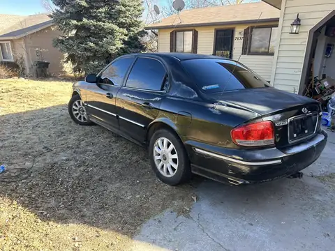 2004 Hyundai Sonata GLS window tint: Double 5% ceramic back glass, Double 20% rear doors, 20% ceramic front doors