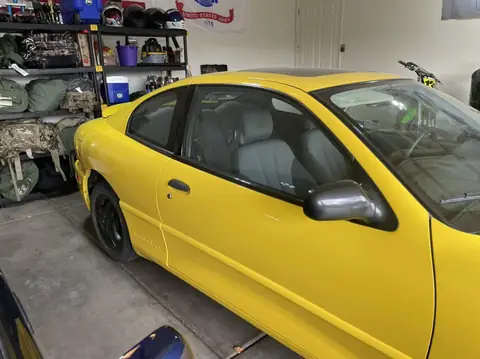 2004 Pontiac Sunfire window tint: 5% Premium Ceramic all windows (view 3)