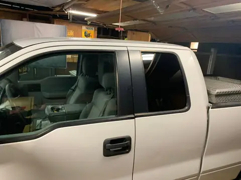 2005 Ford F-150 window tint: 05' F-150 Removed faded tint from rear windshield. Installed new 5% to rear windshield and rear half doors