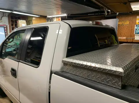 2005 Ford F-150 window tint: 05' F-150 Removed faded tint from rear windshield. Installed new 5% to rear windshield and rear half doors (view 2)