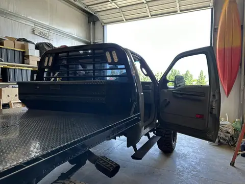 2005 Ford F-250 window tint: Old tint removed, 5% rear window, 20% side windows, 40% full windshield, 5% windshield strip