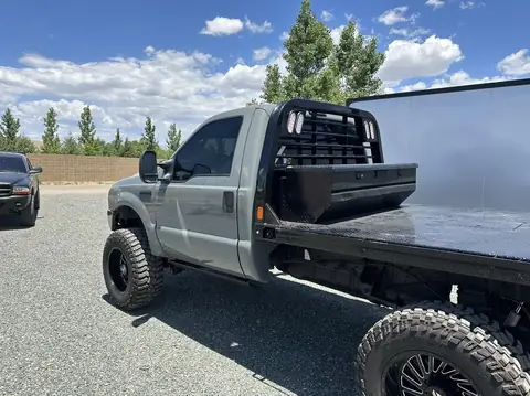2005 Ford F-250 window tint: Old tint removed, 5% rear window, 20% side windows, 40% full windshield, 5% windshield strip (view 3)