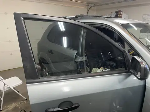 2005 Hyundai Tucson window tint: Faded peeled old tint removed, Premium Nano Ceramic 35% installed (view 3)