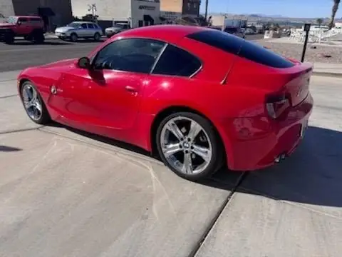2006 BMW coupe window tint: Removed Old 3M Clear from front 2 door windows & installed new Carbon 35% (view 2)