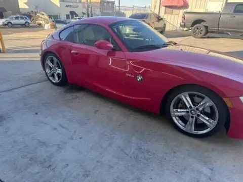 2006 BMW coupe window tint: Removed Old 3M Clear from front 2 door windows & installed new Carbon 35% (view 3)