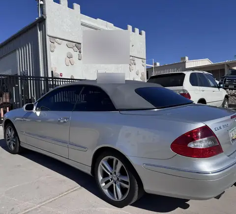 2006 Mercedes CLK350 window tint: 20% C-IR sides and rear window, 5% sunstrip