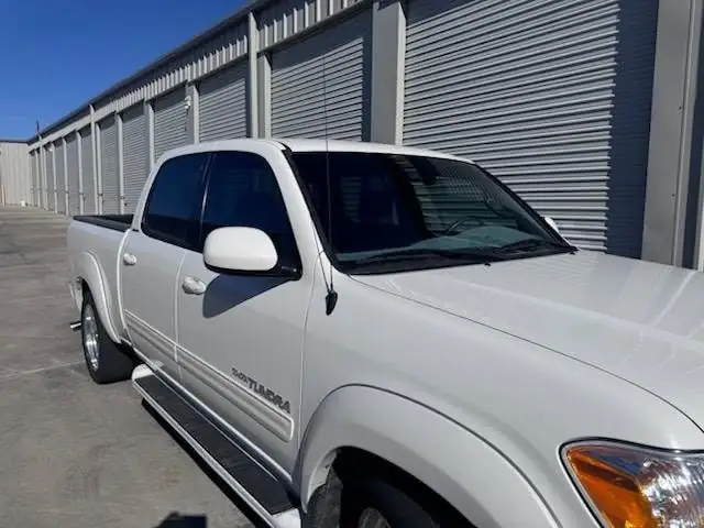2006 Toyota Tundra window tint: Installed 35% Carbon on front 2 door windows and a 3% windshield visor strip (view 3)