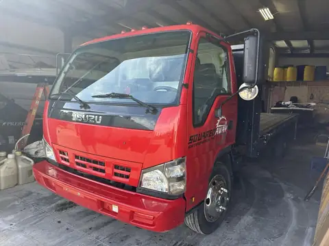 2007 Isuzu NPR window tint: 20% ceramic sides and rear window, 5% top and bottom windshield strip