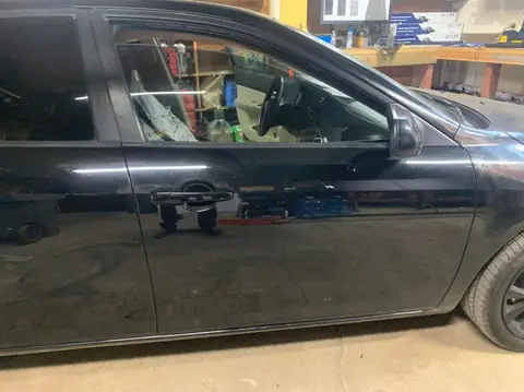 2007 Mazda 6i window tint: Removed the old faded front doors, Redone in 5%, Full windshield done in 20%