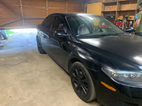 2007 Mazda 6i window tint: Removed the old faded front doors, Redone in 5%, Full windshield done in 20% (view 2)