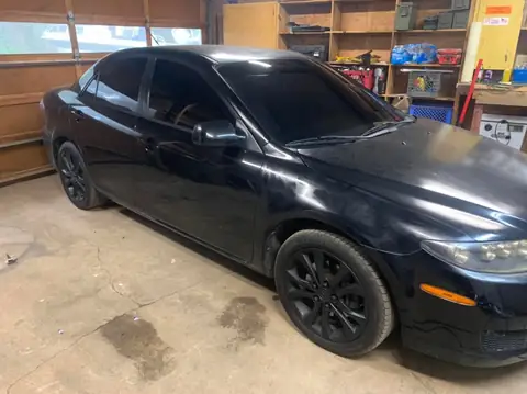2007 Mazda 6i window tint: Removed the old faded front doors, Redone in 5%, Full windshield done in 20% (view 3)