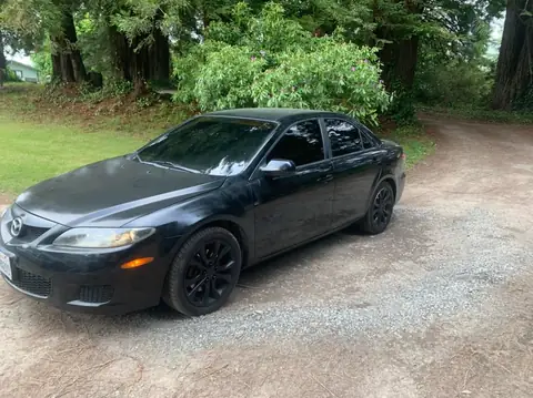 2007 Mazda 6i window tint: Removed the old faded front doors, Redone in 5%, Full windshield done in 20% (view 4)