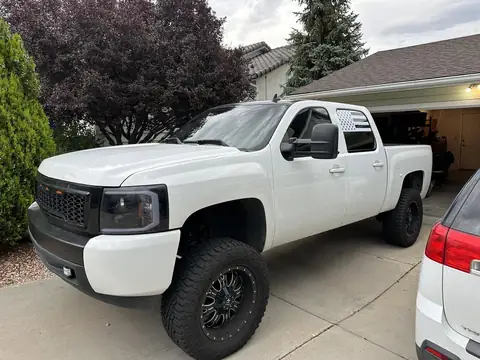 2008 Chevy Silverado window tint: Strip all old tint from sides and back, Xpel Carbon/ceramic 5% all sides and rear, 50% Nano Ceramic full