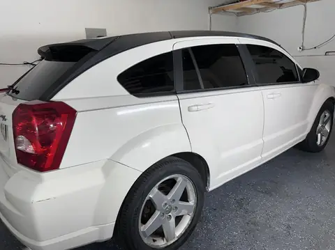 2008 Dodge Caliber window tint: 15% rear hatch and front doors, 5% rear side windows, 50% full windshield (view 2)