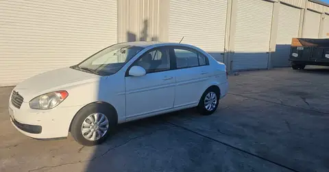 2008 Hyundai Accent window tint: Carbon 20% On All Windows (view 3)