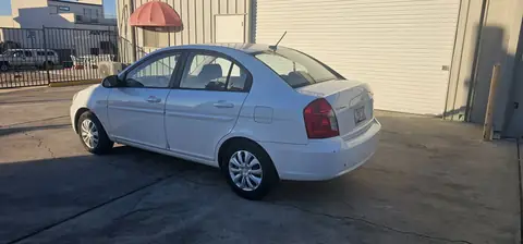 2008 Hyundai Accent window tint: Carbon 20% On All Windows (view 7)
