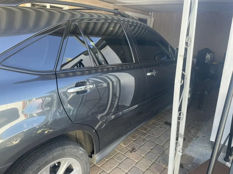 2008 Lexus RX350 window tint: Removed old faded peeling tint from front 2 windows, 15% Standard reinstalled (view 4)