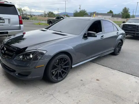2008 Mercedes S550 window tint: Full windshield 35%, Hood and trunk top wrapped in VViViD premium gloss black