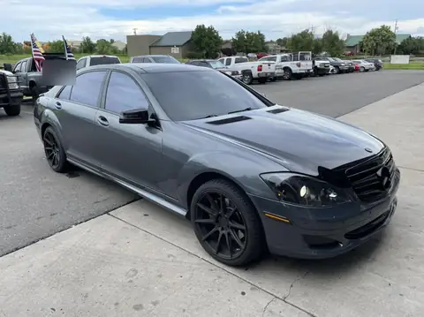 2008 Mercedes S550 window tint: Full windshield 35%, Hood and trunk top wrapped in VViViD premium gloss black (view 3)
