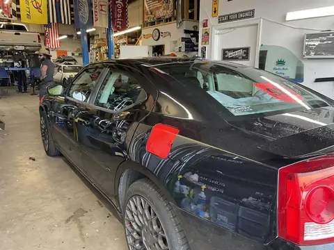 2010 Dodge Charger window tint: All old tint removed, Full BLACKOUT package, 5% premium all doors and rear windshield and sunstrip, 50% premium front